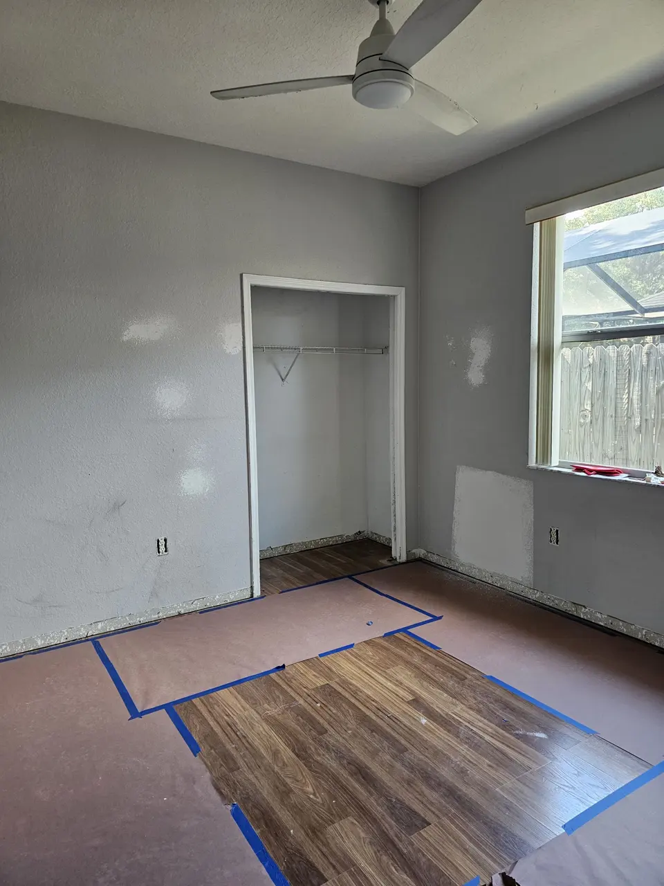 Luxury vinyl plank flooring being installed