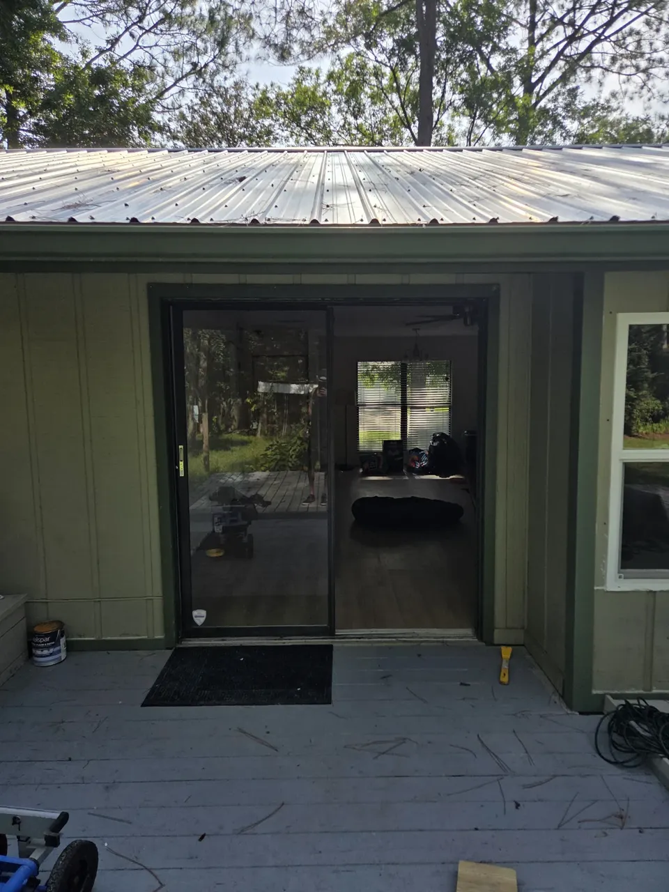 Sliding glass door on the back of the house, from the deck