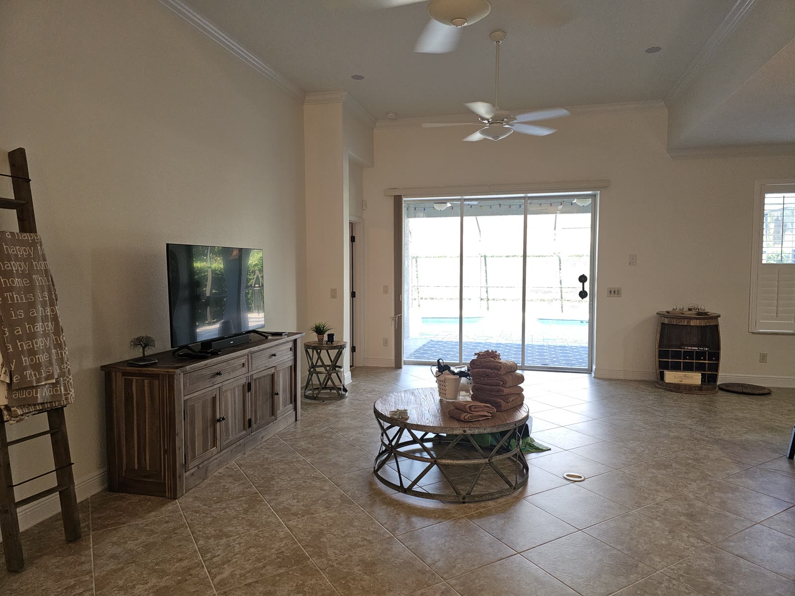 Finished living room with new flooring and a clean, bright finish